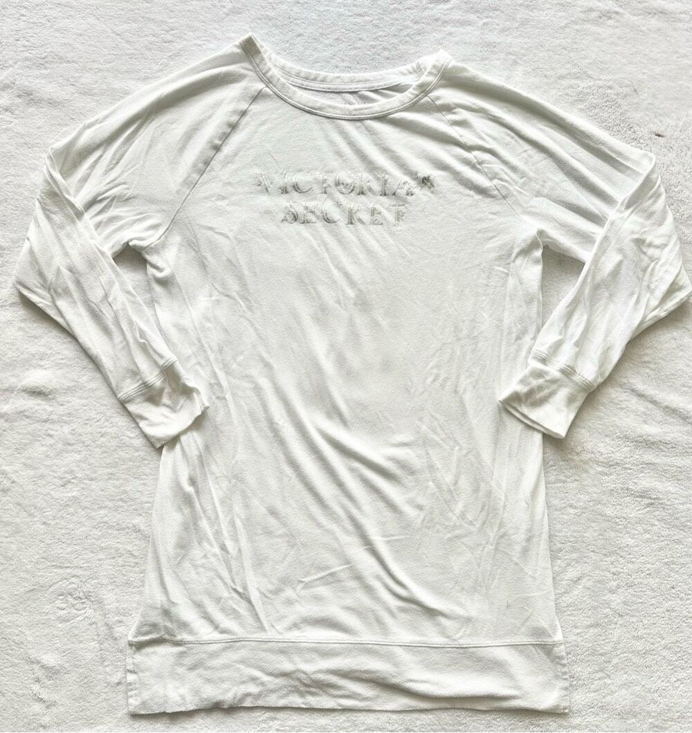 Victoria’s Secret white long sleeve sleeve shirt with metallic writing - used -